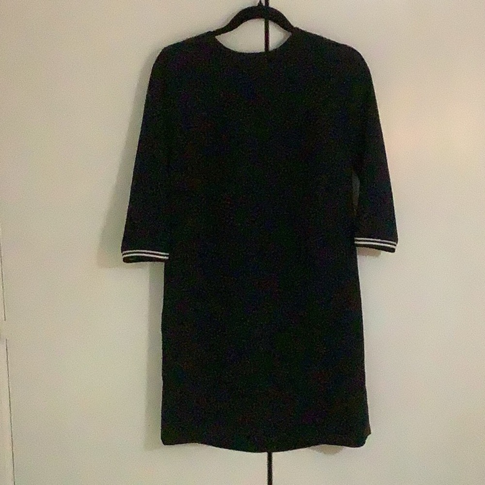Sporty navy dress with side stripes and cuffs
